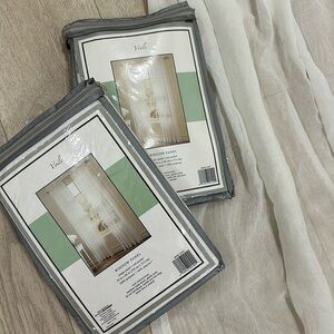 Cream textured fabric curtains